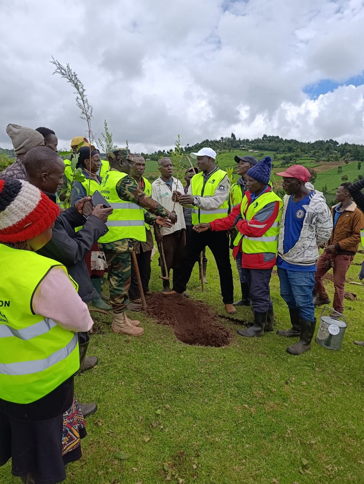 Community members planting trees together